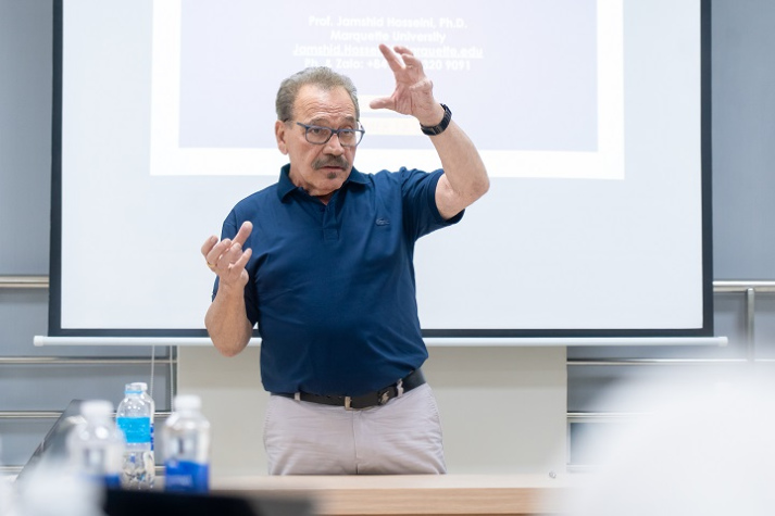 Business Administration students approach global economic policy with expert from Marquette University 21